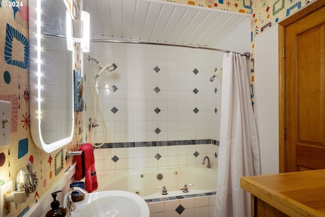 bathroom featuring sink and shower / bath combo