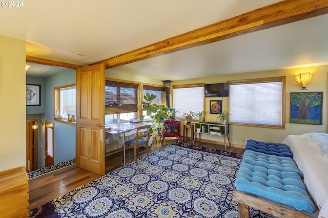 living room with beam ceiling and hardwood / wood-style flooring