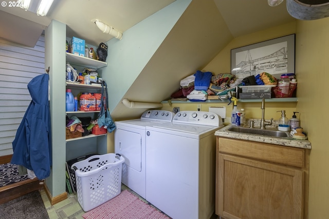 washroom featuring washer and clothes dryer and sink