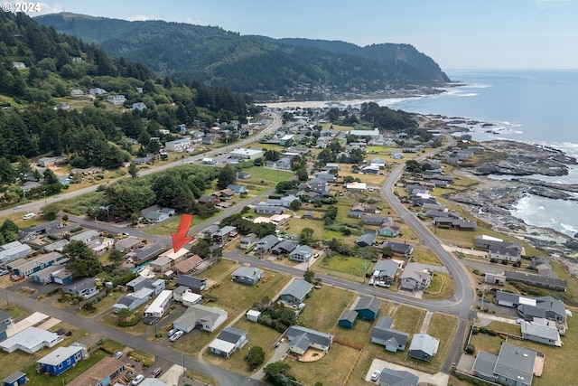 bird's eye view with a water and mountain view