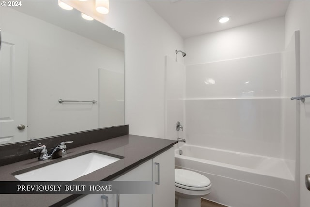 full bathroom with toilet, bathtub / shower combination, and vanity