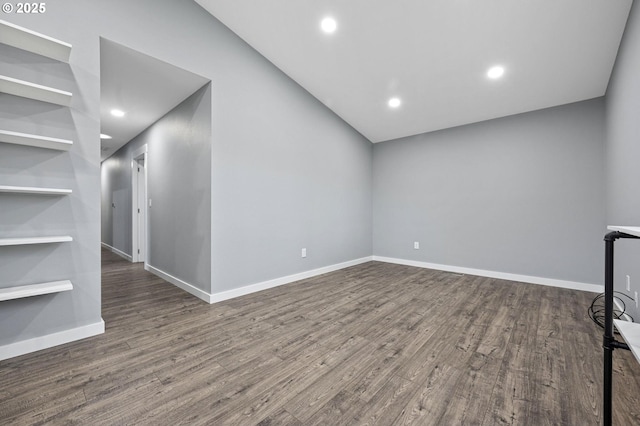 unfurnished living room with dark hardwood / wood-style floors