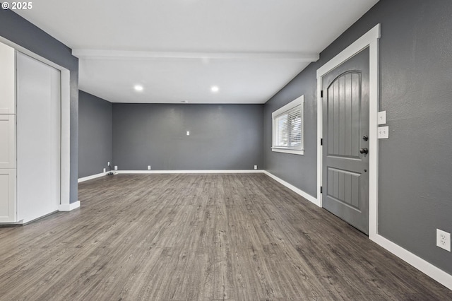 interior space with hardwood / wood-style flooring