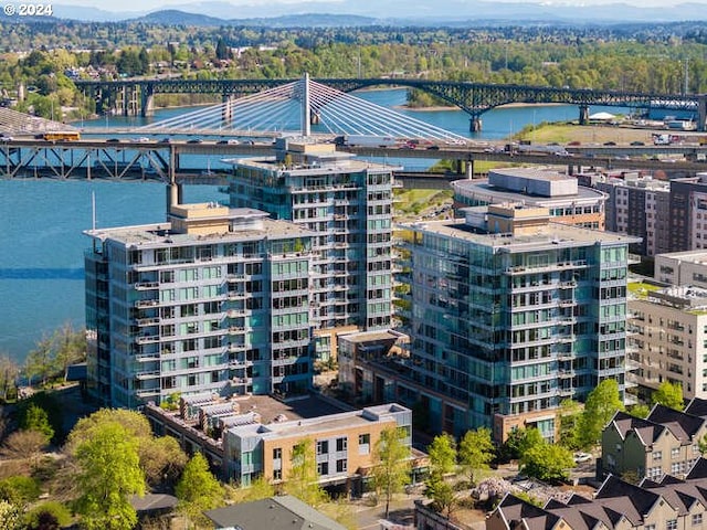 aerial view featuring a view of city and a water view