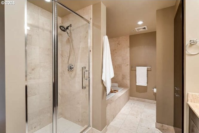 full bath featuring a bath, visible vents, a shower stall, and vanity