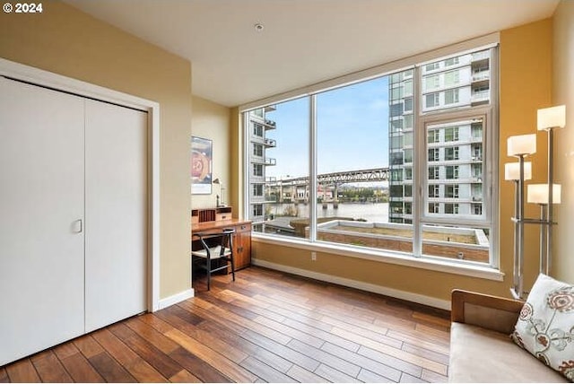 sitting room with hardwood / wood-style floors