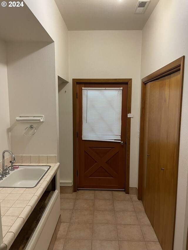 87535 Tiernan Rd, Mapleton, OR 97453 - interior space with tile patterned floors, visible vents, and vanity
