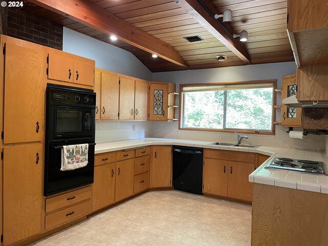 87535 Tiernan Rd, Mapleton, OR 97453 - kitchen with a sink, open shelves, tile countertops, black appliances, and decorative backsplash