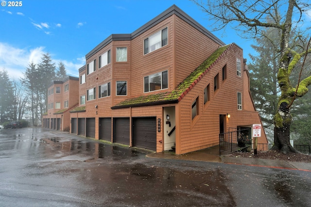 view of building exterior with a garage