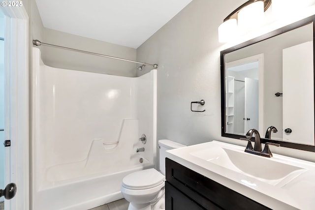 full bathroom featuring tile patterned floors, vanity, shower / bath combination, and toilet