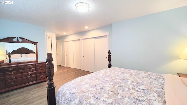 bedroom featuring hardwood / wood-style flooring