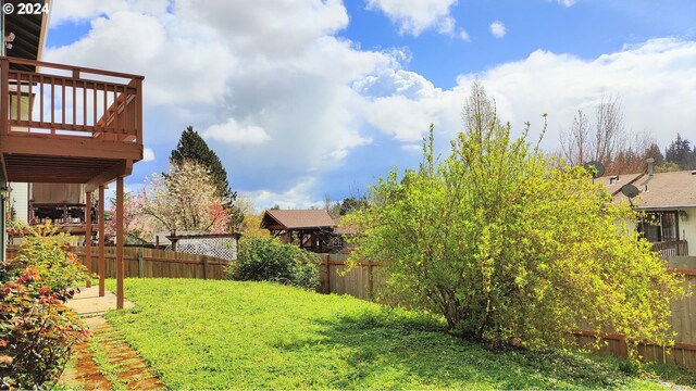 view of yard with a deck