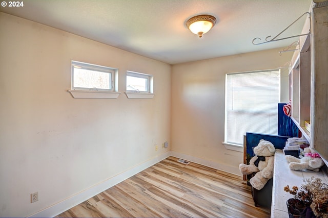 misc room with light hardwood / wood-style floors