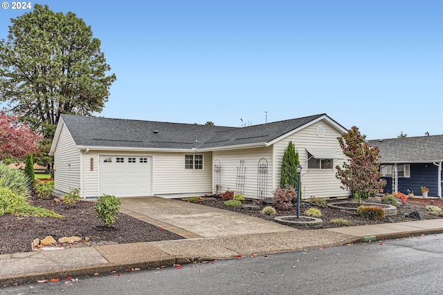 single story home featuring a garage