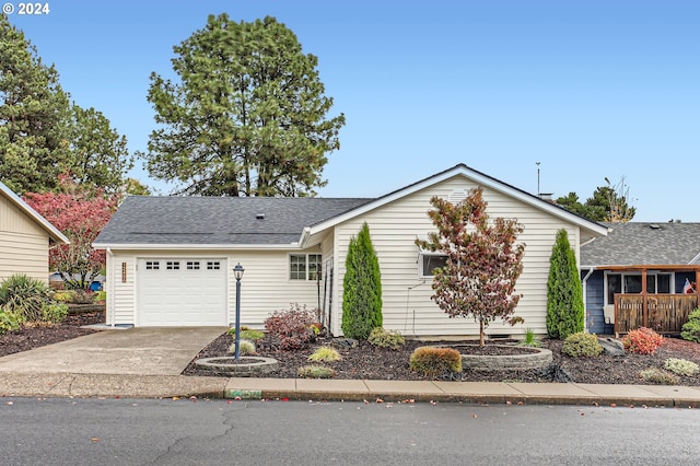 single story home featuring a garage