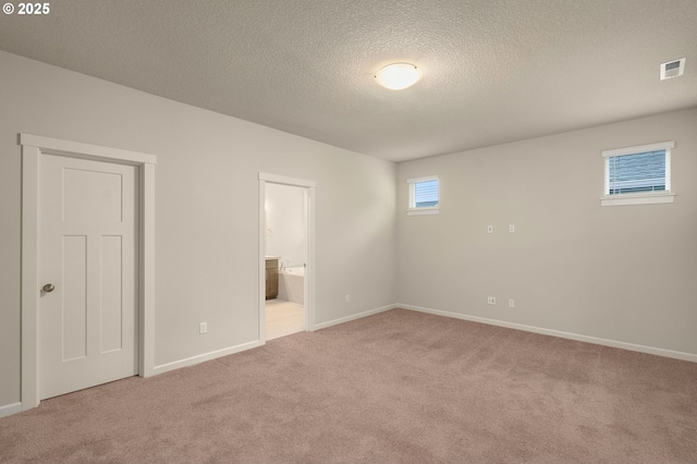 interior space with a textured ceiling