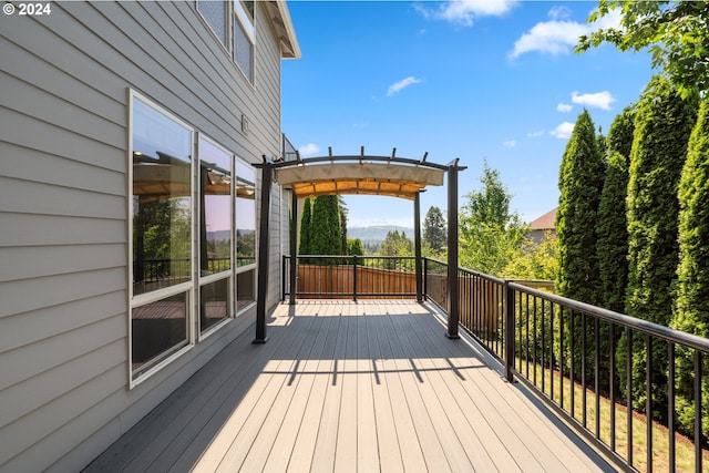 deck featuring a pergola