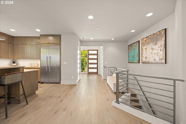 hallway featuring light hardwood / wood-style floors