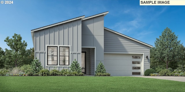 modern home featuring a front lawn and a garage