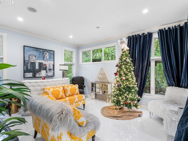 living room featuring a wealth of natural light and ornamental molding