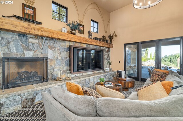 26590 SW French Oak Dr, West Linn, OR 97068 - living room featuring a stone fireplace and a towering ceiling