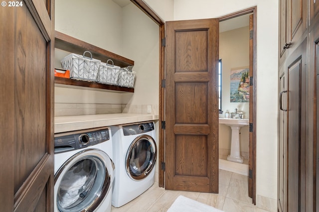 26590 SW French Oak Dr, West Linn, OR 97068 - laundry room with washing machine and dryer and laundry area