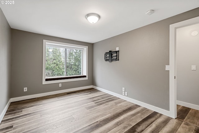 empty room featuring light wood-type flooring