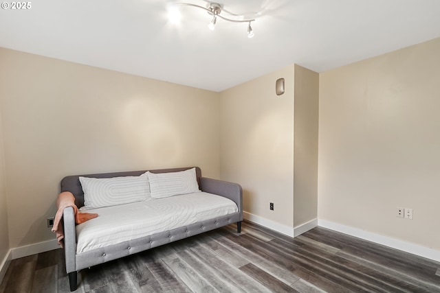 sitting room with dark hardwood / wood-style floors