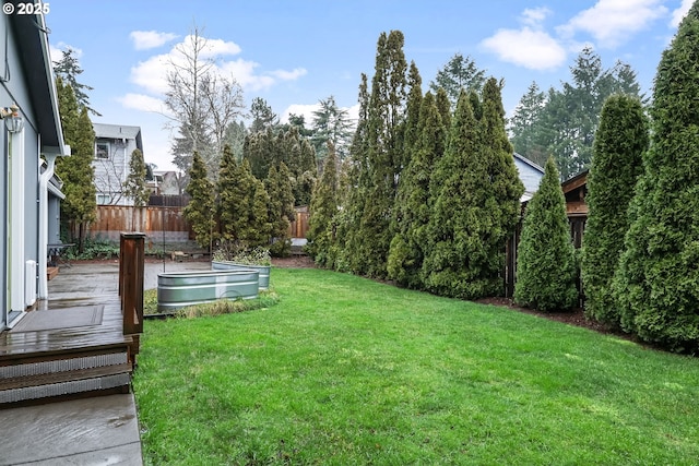 view of yard with a wooden deck