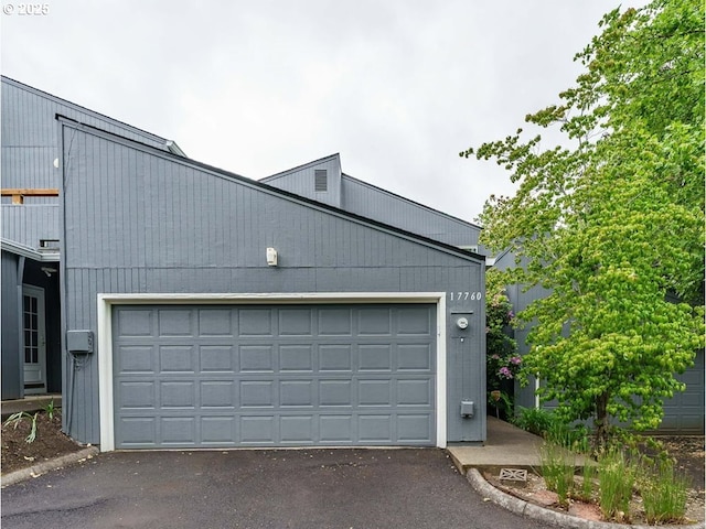 17760 NW Rolling Hill Ln, Beaverton, OR 97006 - garage with asphalt driveway