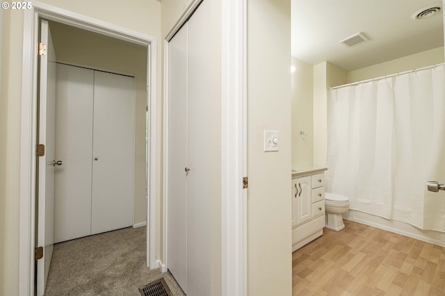 17760 NW Rolling Hill Ln, Beaverton, OR 97006 - bathroom featuring toilet, vanity, and wood finished floors