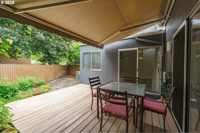 17760 NW Rolling Hill Ln, Beaverton, OR 97006 - wooden terrace with outdoor dining space and cooling unit