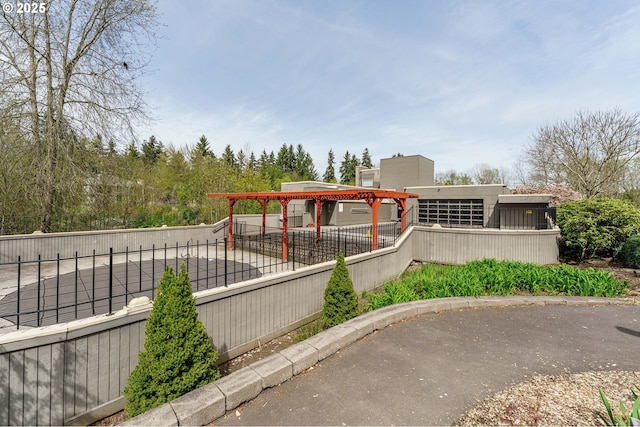 17760 NW Rolling Hill Ln, Beaverton, OR 97006 - exterior space with a fenced front yard and a carport