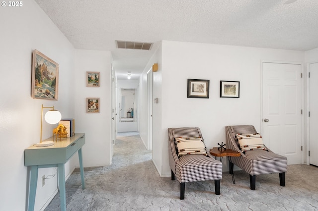 266 NE 193rd Ave, Portland, OR 97230 - living area featuring carpet and a textured ceiling
