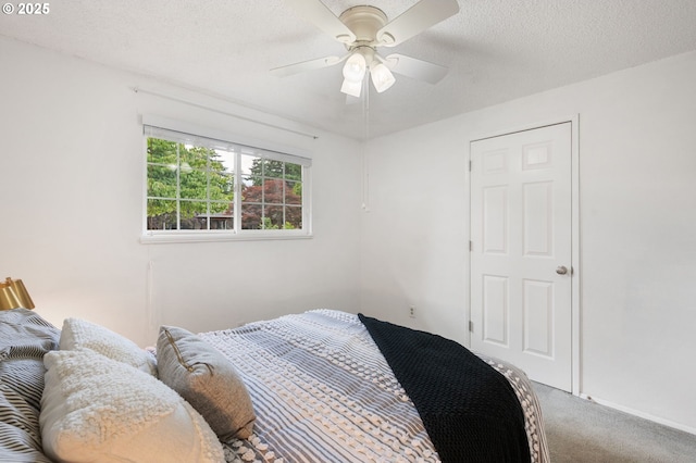 266 NE 193rd Ave, Portland, OR 97230 - bedroom with carpet floors, a textured ceiling, and ceiling fan