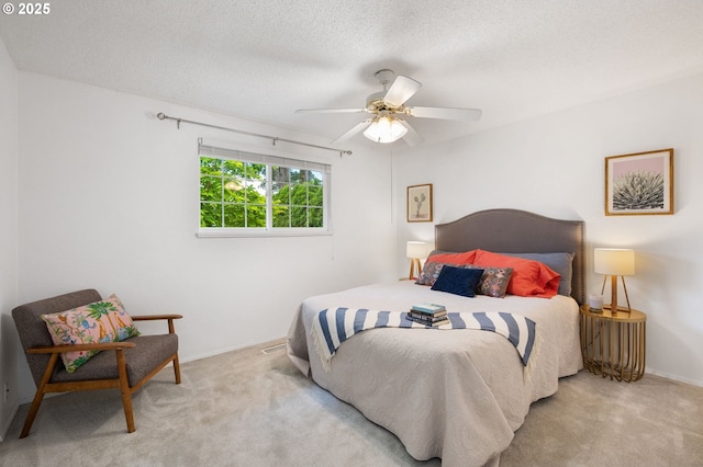 266 NE 193rd Ave, Portland, OR 97230 - carpeted bedroom featuring a ceiling fan and a textured ceiling