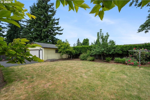266 NE 193rd Ave, Portland, OR 97230 - view of yard with an outbuilding and a garage