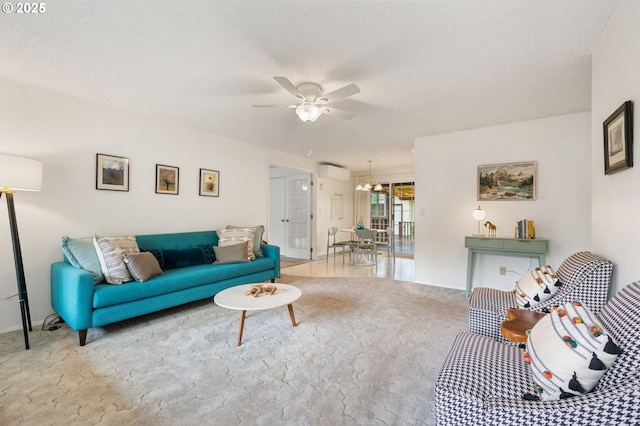 266 NE 193rd Ave, Portland, OR 97230 - carpeted living area featuring a ceiling fan, an AC wall unit, and a chandelier