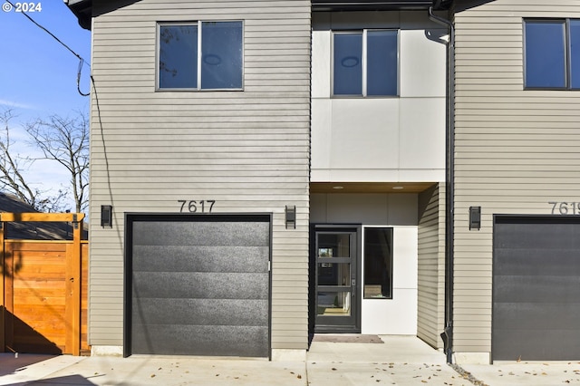 view of front of property featuring a garage