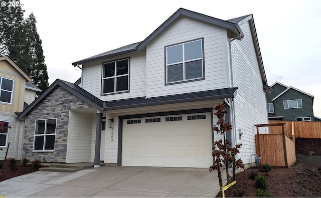 view of front of home with a garage