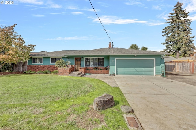 single story home with a garage and a front lawn