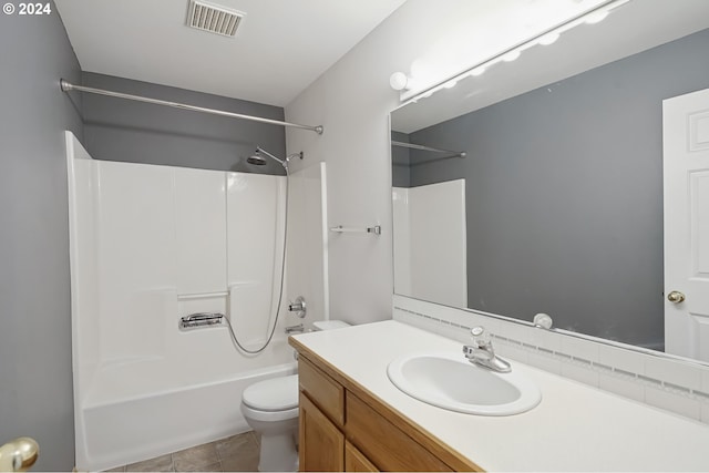 full bathroom with bathing tub / shower combination, vanity, and toilet