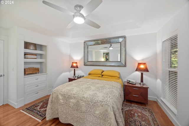 bedroom featuring ceiling fan and hardwood / wood-style floors