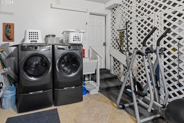 laundry room with washer and clothes dryer