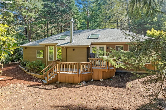 ranch-style home with a deck