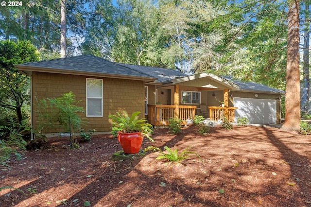 single story home featuring a garage