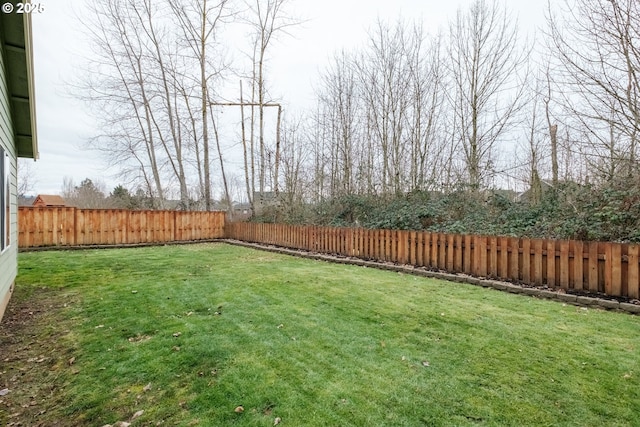 view of yard featuring a fenced backyard