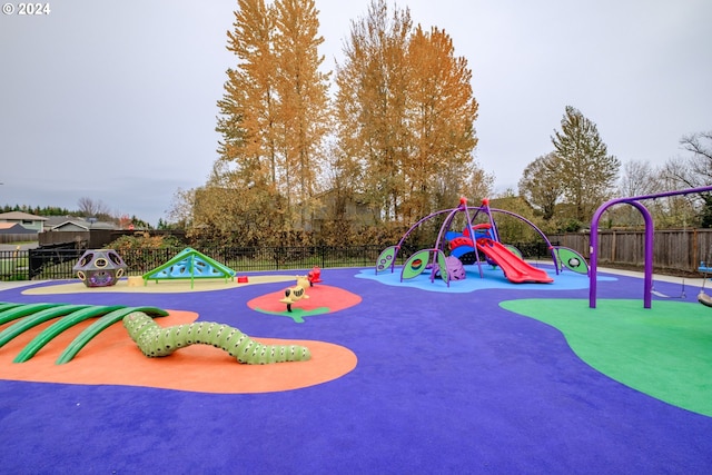 community playground featuring fence