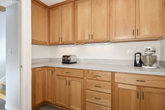 kitchen featuring light brown cabinets