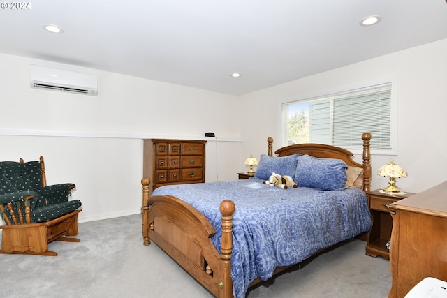 bedroom with light carpet and a wall mounted air conditioner